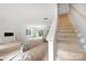 Unfinished staircase leading to the second floor within an open floor plan at 4615 Yellow Poplar Ln, Concord, NC 28025