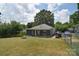 Large backyard with covered patio, grill, and plenty of space for outdoor enjoyment at 502 Allison Nw St, Concord, NC 28025