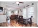 Open dining area connecting seamlessly to the living room and modern kitchen at 502 Allison Nw St, Concord, NC 28025