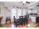 Bright dining area with seating for six and direct access to the updated kitchen at 502 Allison Nw St, Concord, NC 28025