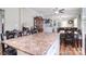 Spacious kitchen island with seating, connecting to dining area and living room at 502 Allison Nw St, Concord, NC 28025