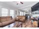 Spacious living room with open access to the kitchen and ample natural light at 502 Allison Nw St, Concord, NC 28025