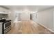 Spacious living area with hardwood floors open to the kitchen at 1354 Springwood Ln, Rock Hill, SC 29730