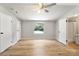 Spacious main bedroom featuring hardwood floors, ample closet space, and an attached bath at 1354 Springwood Ln, Rock Hill, SC 29730