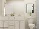 Bathroom featuring a double vanity, neutral color scheme, and modern fixtures at 1606 Swallow Tail Dr, Cramerton, NC 28012