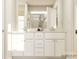 Bathroom featuring a dual vanity, modern white cabinets, and sleek fixtures at 1606 Swallow Tail Dr, Cramerton, NC 28012