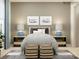 Serene bedroom featuring a cozy bed, decorative accents, and soft, inviting lighting at 1606 Swallow Tail Dr, Cramerton, NC 28012