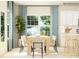 Bright dining area featuring a wooden table, stylish chairs, and views of the backyard at 1606 Swallow Tail Dr, Cramerton, NC 28012