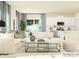 Bright living room with white sectional, neutral decor, and an open view to the kitchen at 1606 Swallow Tail Dr, Cramerton, NC 28012