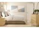 Inviting bedroom with a stylish bed, neutral tones, decorative wall art, and natural light at 1613 Swallow Tail Dr, Cramerton, NC 28012