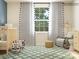 Cozy Bedroom featuring a wooden crib, patterned curtains, and a comfortable rocking chair with side table at 1616 Swallow Tail Dr, Cramerton, NC 28012