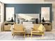 A luxurious bedroom has two chairs, decorative pillows, and side tables with lamps at 1616 Swallow Tail Dr, Cramerton, NC 28012