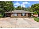 Charming single-story brick home with a spacious driveway and classic black shutters at 508 Gantt St # 1-2, Kings Mountain, NC 28086