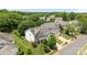 Aerial view of a well-maintained home with manicured lawn and mature trees in a residential neighborhood at 10418 Cullen Ct, Charlotte, NC 28278