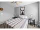 Clean bedroom with ceiling fan, carpet, and natural light from the window at 10418 Cullen Ct, Charlotte, NC 28278