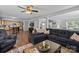 Open-concept living room seamlessly connects to the kitchen and dining areas at 10418 Cullen Ct, Charlotte, NC 28278