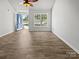 Inviting space boasts tile flooring, a bright window, and a blue front door, offering a versatile area for relaxation at 1634 Dawson Ct, Rock Hill, SC 29730
