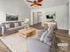 Inviting living room boasts neutral tones, plush seating, and stylish décor, perfect for comfortable living and entertaining at 1634 Dawson Ct, Rock Hill, SC 29730