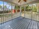Relaxing screened porch with ceiling fan and access to the backyard at 1634 Dawson Ct, Rock Hill, SC 29730