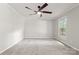 Bedroom featuring gray walls, carpet and a ceiling fan at 2508 Wood Star Ct, Matthews, NC 28105