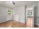Comfortable bedroom with natural light and access to the backyard through a glass door at 2508 Wood Star Ct, Matthews, NC 28105