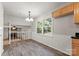 Light-filled dining area with views into the adjacent living room and natural light at 2508 Wood Star Ct, Matthews, NC 28105