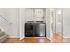 Laundry closet with side-by-side washer and dryer and storage above at 2508 Wood Star Ct, Matthews, NC 28105