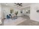 Inviting living room featuring recessed lighting, gray wood-look floors, and an open layout to the kitchen at 3015 Lasalle St, Charlotte, NC 28216