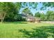 Expansive backyard view showcasing a well-maintained lawn and deck, providing an ideal outdoor living space at 630 4Th Nw Ave, Hickory, NC 28601