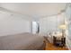 Clean bedroom featuring hardwood flooring, neutral walls, trim, and stylish furnishings at 630 4Th Nw Ave, Hickory, NC 28601