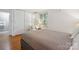 Neat bedroom featuring hardwood flooring, neutral walls, trim, and stylish furnishings at 630 4Th Nw Ave, Hickory, NC 28601