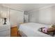 Comfortable bedroom featuring a closet, neutral walls, trim, and hardwood flooring at 630 4Th Nw Ave, Hickory, NC 28601