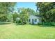 Lovely exterior shot of a home with a lush green lawn, showcasing its charming curb appeal and neighborhood setting at 630 4Th Nw Ave, Hickory, NC 28601