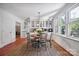 Eat-in kitchen featuring white cabinets and a sunny dining nook at 630 4Th Nw Ave, Hickory, NC 28601