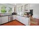 Functional kitchen features stainless steel appliances, tile floors, and plenty of storage at 630 4Th Nw Ave, Hickory, NC 28601