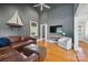 Bright living room featuring hardwood floors, stylish furniture, and natural light at 630 4Th Nw Ave, Hickory, NC 28601