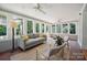 Cozy sunroom with lots of windows offering natural light and an outside view at 630 4Th Nw Ave, Hickory, NC 28601