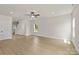 Spacious living area with natural light, neutral paint, and hardwood flooring at 7007 Jerimoth Dr, Charlotte, NC 28215