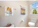 This half bath offers a single vanity and a standard toilet at 7015 Gracefield Ln, Fort Mill, SC 29707