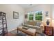 Cozy living room with natural lighting, neutral colors, and comfortable seating at 7015 Gracefield Ln, Fort Mill, SC 29707