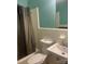 Cozy bathroom features a shower and white tiled walls at 1320 Kings Cir, Shelby, NC 28150