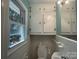 Cozy bathroom with built-in vanity and sink, offering practical storage solutions at 1320 Kings Cir, Shelby, NC 28150