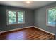 Bright bedroom featuring wood-look flooring and a bright window offering a pleasant view at 1320 Kings Cir, Shelby, NC 28150