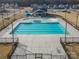 Community pool with a covered lounge area and perimeter fencing for recreation and relaxation at 150 Nicholson Ln, Mooresville, NC 28115