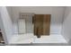 A beautiful combination of neutral tones on a cabinet, counter, tile, and flooring selection at 150 Nicholson Ln, Mooresville, NC 28115