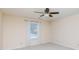 Neutral bedroom featuring a ceiling fan, window with blinds, and plush carpet at 238 Pointe Cir, Rock Hill, SC 29732