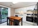 Functional kitchen featuring white cabinets, an island, and modern appliances at 238 Pointe Cir, Rock Hill, SC 29732
