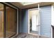 A back deck area leads to a storage room, and is accessible from the interior via sliding glass doors at 238 Pointe Cir, Rock Hill, SC 29732
