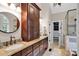 Beautiful bathroom with double vanities, large mirror, and walk-in closet at 4552 Sawgrass Ct, Denver, NC 28037