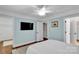 Bedroom with light blue walls, hardwood floors, and white trim at 4552 Sawgrass Ct, Denver, NC 28037
